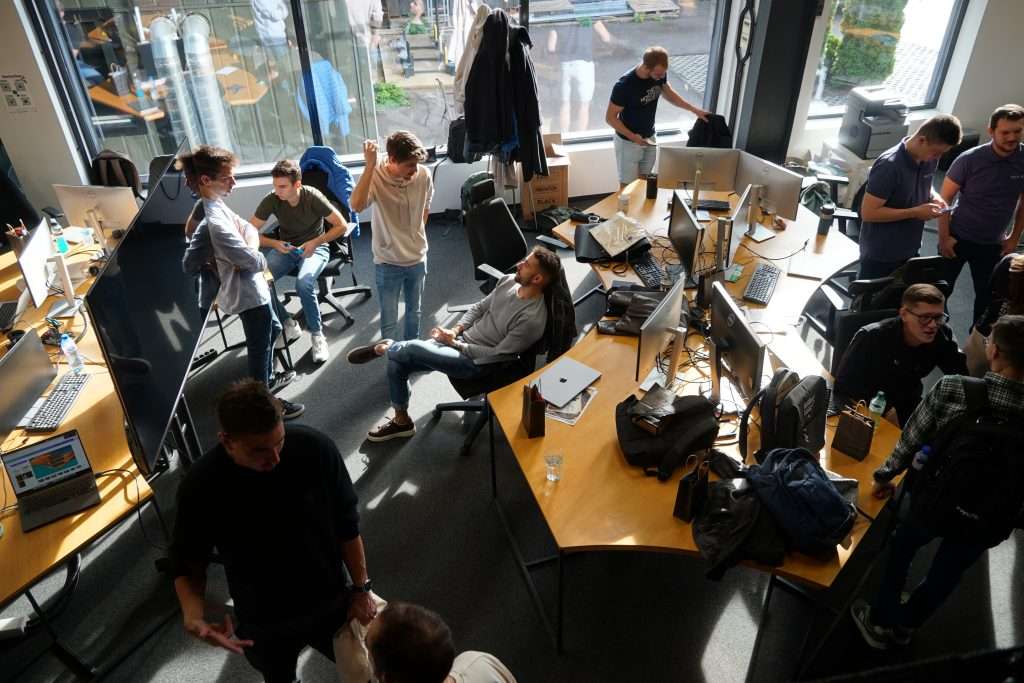 Teams coding at a hackathon at Work&Share, Sofia